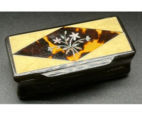 19th century Horn snuff box detailed with mother of pearl and tortoise shell inlay. [2x6x3cm] 