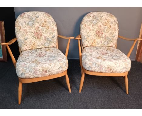 A Pair of vintage Ercol 'Windsor', elm light wood armchairs, with original cushions. 
