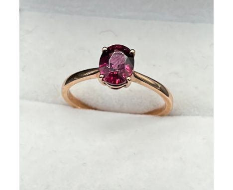 10ct rose gold ladies ring set with a single oval cut pink tanzanite stone. [Ring size R] [2.37Grams] 