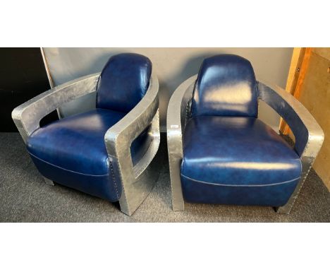Pair of Art Deco Aviator style lounge chair, covered in blue leather, within an aluminium frame 
