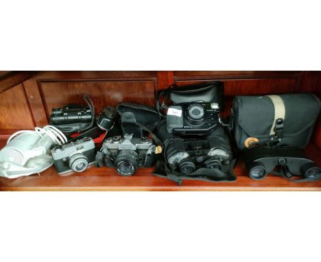 Shelf of Camera a to include fujica , binoculars includes Miranda etc 