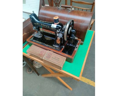 Antique singer sewing machine with accessories together with card table . 