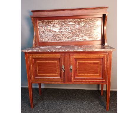 Edwardian washstand, the open shelf above a marble wash top and back plate, the lower with two inlaid doors leading to interi