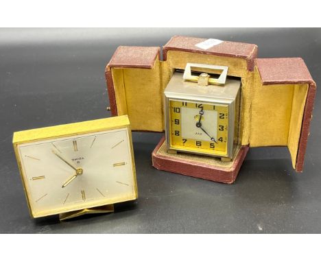 Vintage Swiza 8 alarm clock and a vintage French Jaz travel alarm clock with case. [Jaz works- other needs attention] 