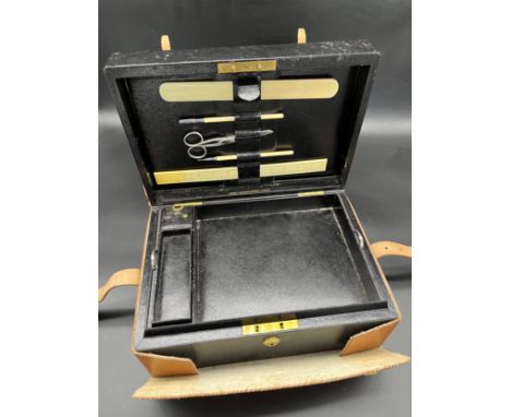 Antique Asprey of London leather travel stationary box with tan leather travel case. Fitted interior, ink well pot and lighte