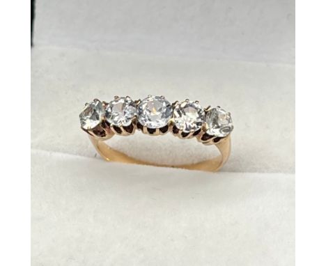 Antique Unmarked Yellow gold ladies ring set with 5 white Sapphires. [Ring size K] [2.65Grams] 