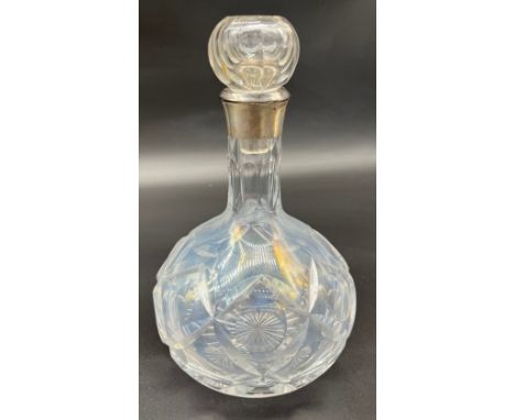 Antique cut crystal decanter with foreign silver collar. [22cm high] 