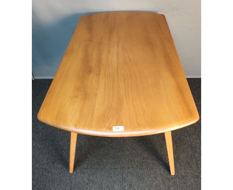 Vintage Ercol 'Windsor' light elm wood dining table with drop ends, raised on square tapered legs [73x125x114cm] 