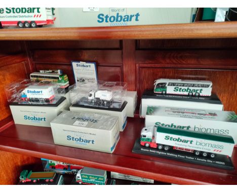 Shelf of boxed Eddie stobart model trucks etc 