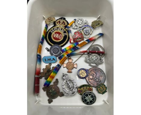 Collection of pin badges and military bars. Includes Royal Army Medical corp cap badge. 