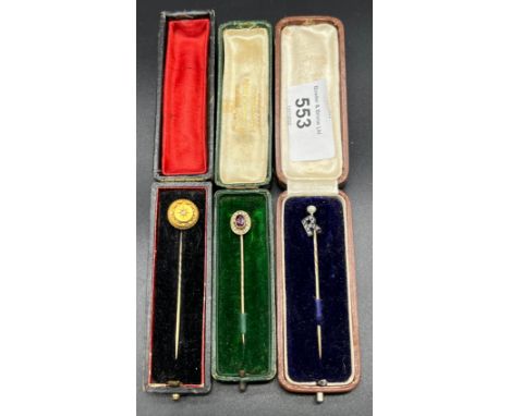 Three antique gold pins fitted with precious stones, Round gold pin is fitted with a single diamond, Letter 'R' pin is fitted