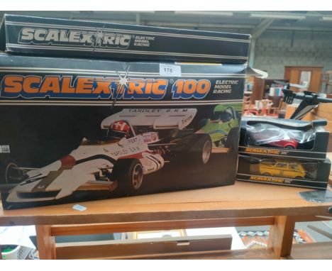 Shelf of vintage scalextrics items includes mini cars etc. 