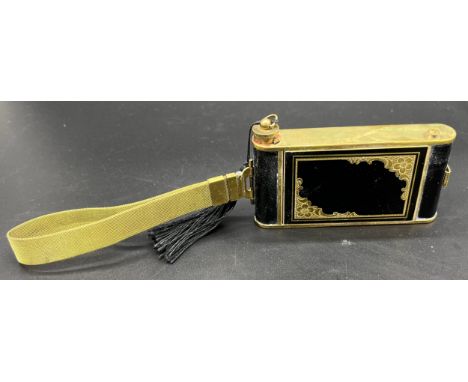 Vintage Camera shaped ladies compact case. Black/ gilt metal design. Fitted with cigarette dispenser with original cigarettes