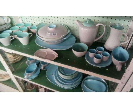 TWO SHELVES OF STYLISH POOLE POTTERY DINNER &amp; TEA WARE