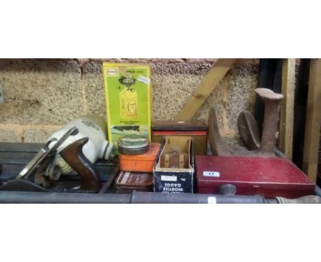 SHELF CONTAINING A SHOE LAST, STONE WATER BOTTLE, STANLEY PLANE, MORTICE GAUGE, PRIMUS STOVE &amp; BRASS SYRINGE 