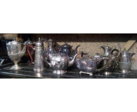 SHELF OF VARIOUS SHAPED PLATED COFFEE POTS, TEA POTS &amp; WATER JUGS