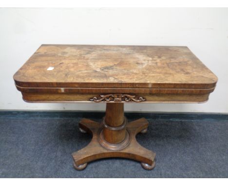 A Victorian rosewood pedestal card table 