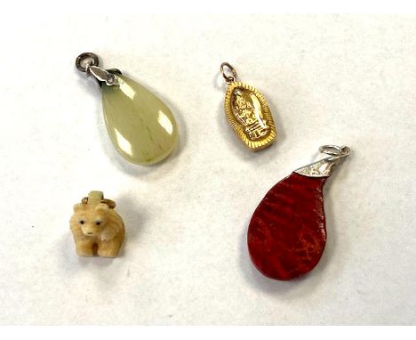 Four vintage pendants.