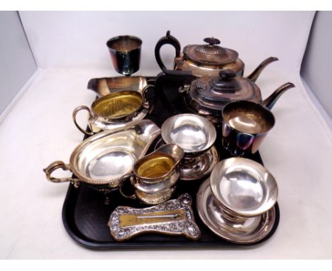 A tray of silver plated part tea set, gravy boat, silver mounted thermometer (af) etc 