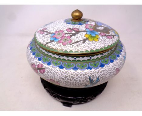 A cloisonne lidded pot on stand together with a further ceramic muffin dish on stand 