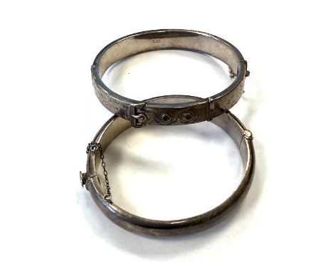 2 Silver vintage bangles.