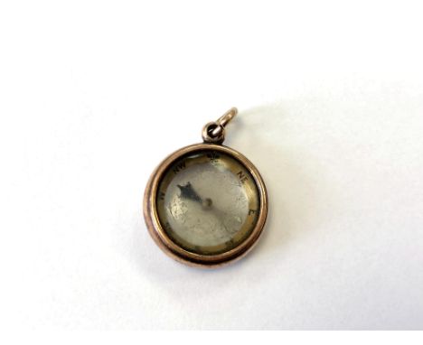An antique 10ct gold compass 