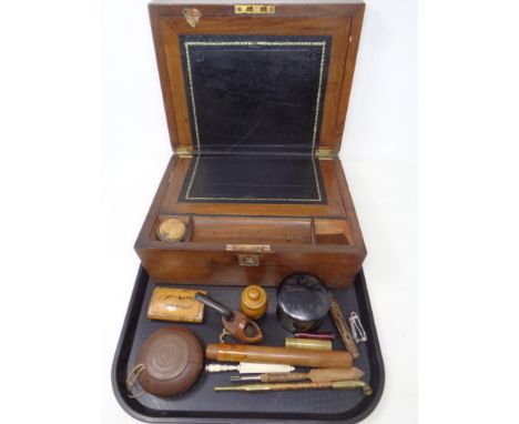 A 19th century mahogany writing box together with a brass mounted pipe, lacquered box, snuff box etc 