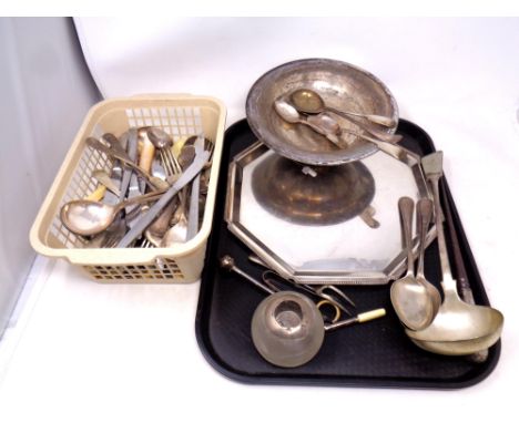 A tray of silver plated items, cutlery, ladle, match striker etc 