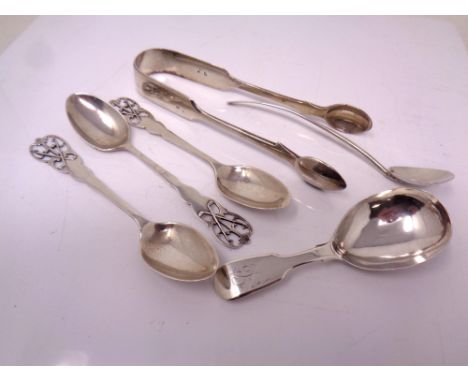 A small quantity of silver cutlery including caddy spoon, sugar tongs, teaspoons, 103.3g.