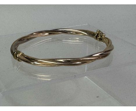 ITALIAN GOLD TWIST BANGLE, MARKED FOR NINE CARAT GOLD twist design, marked for nine carat gold7cm wideQty: 6g