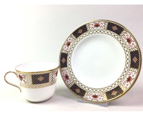 ROYAL CROWN DERBY PART COFFEE SERVICE, PATTERN 1253 comprising cups, saucers and plates, each decorated with flowers, surroun