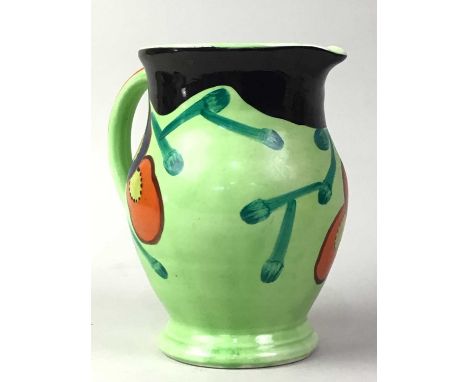 SUSIE COOPER ART DECO PITCHER, WITH THREE OTHER PITCHERS the Susie Cooper pitcher, green ground decorated with fruitSusie Coo