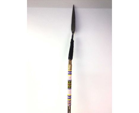 AFRCIAN TRIBAL STYLE SPEAR, ALONG WITH FURTHER ITEMS the spear with bead work decoration, along with an African nomadic style