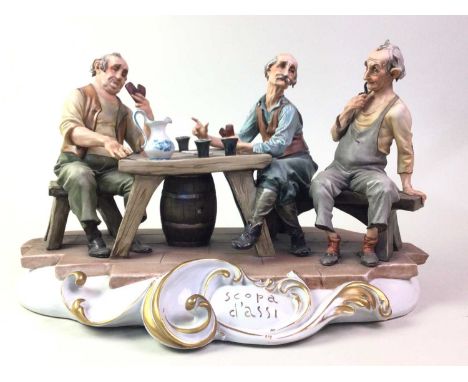 CAPODIMONTE, SCOPA D'ASSI a ceramic figure group of men playing cards in a tavern39cm wide 