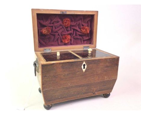 ROSEWOOD TEA CADDY, EARLY 19TH CENTURY  of sarcophagus shape, with ball feetThis lot contains elephant ivory material. Severa