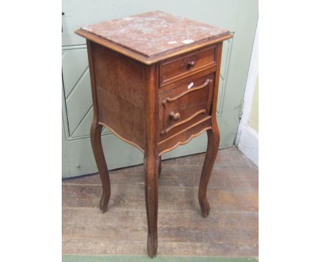 A 19th century walnut bedside or lamp table with marble top, the walnut framework with quarter panelled and other detail, enc