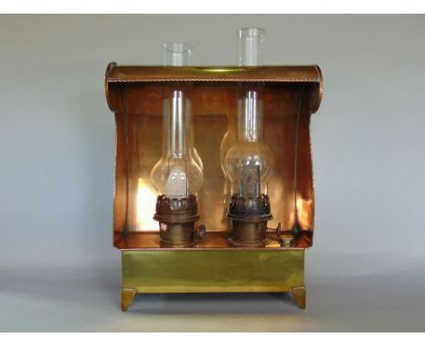 An interesting copper cased Aladdin paraffin radiator, with twin lamp fitting, 46cm high