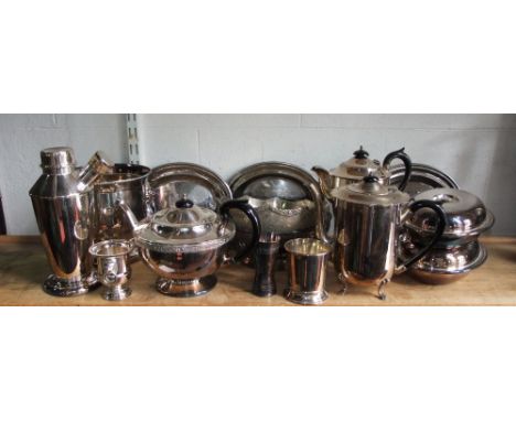 A mixed collection of silver plated items to include various tea wares, entree dished, twin handled wine bucket, cocktail sha