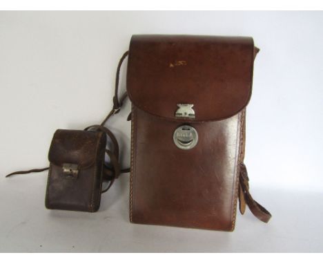Kodac No 3A folding pocket camera within a leather carry case, together with a further vest pocket autographic Kodac, within 
