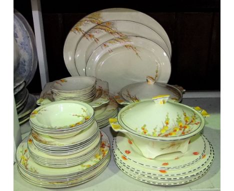 A collection of Crown Ducal Art Deco dinner wares in the Pussy Willow pattern comprising a pair of tureens and covers, three 