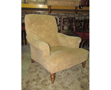 A Victorian style two seat Chesterfield sofa with rolled arms and beige ground scrolling acanthus patterned upholstery, toget