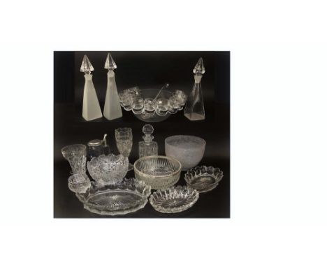 A mixed collection of glassware to include a good cut glass fruit bowl, decanter and others; together with a further Cowdy gl