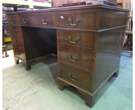 A reproduction Georgian style mahogany veneered twin pedestal writing desk of rectangular form with inset leather panelled to