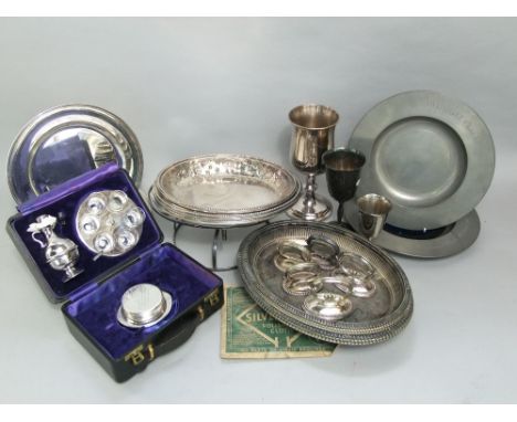 A collection of communion white metal to include a leather cased travelling communion set, three silver plated goblets, four 