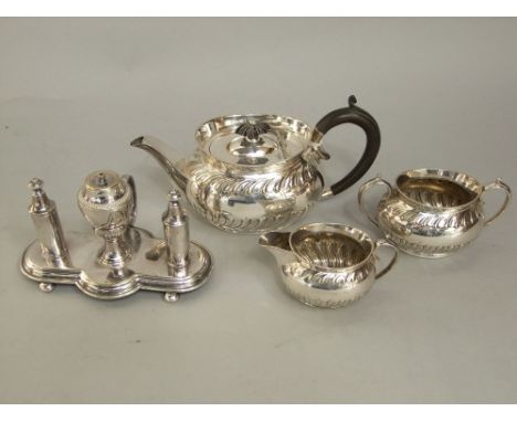 James Dixon three piece bachelor boat shaped silver plated tea service comprising tea pot, sucrier and milk jug; together wit