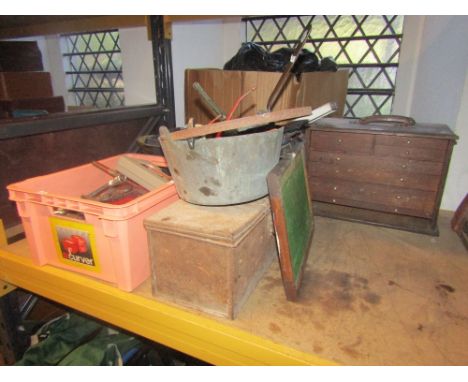 A vintage oak cased portable engineers tool chest with removable rectangular panelled removable front enclosing a fitted inte