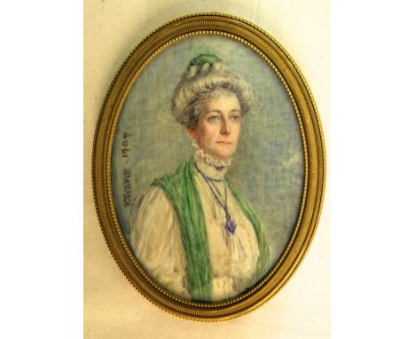 R Evans (early 20th century British school) - Half length miniature portrait of a lady in Edwardian dress, possibly of suffra