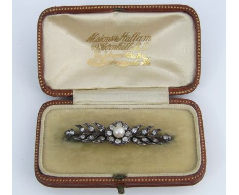 A pearl and rose cut diamond floral spray brooch with central flower head motif, in unmarked silver and gold, 4.3cm approx, i