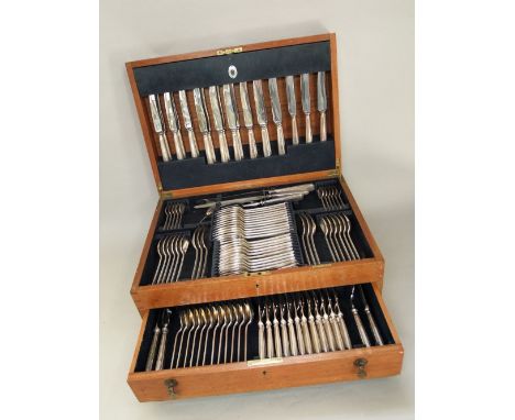 Art deco Mappin & Webb oak canteen of cutlery, the hinged lid enclosing a part fitted interior with various knives, forks and