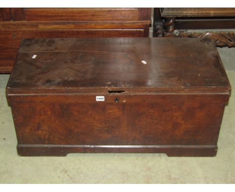 A 19th century elm blanket box with hinged lid, exposed dovetail construction and side carrying handles, together with an ex-